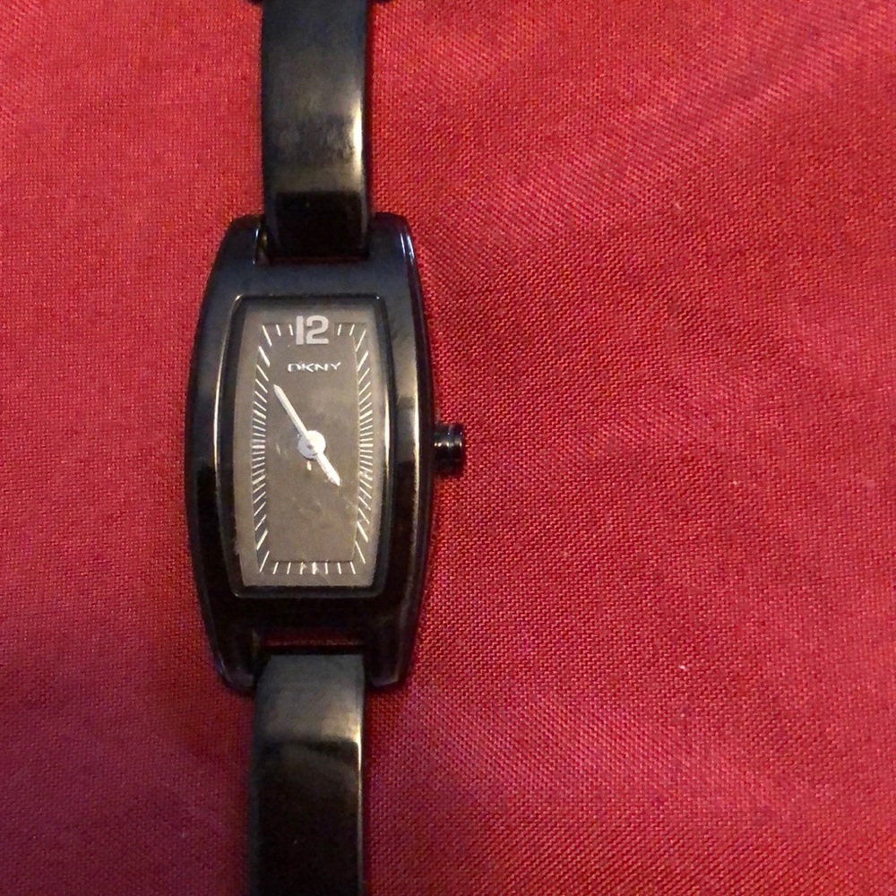 EUC Black stainless steel woman’s DNKY watch